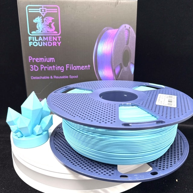 Sky Blue PLA Classic Filament - 1.75mm 1kg spool with a matching crystal sample print and Filament Foundry packaging.